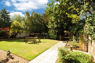 a picture of the royal leamington spa nursing home beautiful gardens
