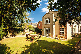 a picture of the royal leamington spa nursing home beautiful garden looking back at the home