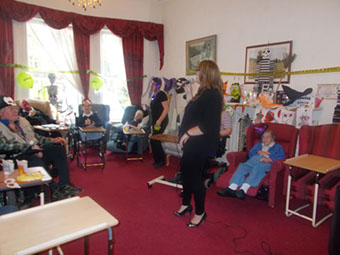 wider view of same group interacting with one another
