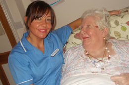 care staff and resident enjoying their time together